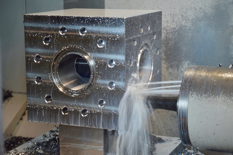 A API studded block inside a CNC machine